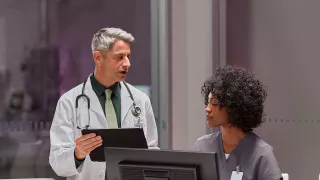 Healthcare professionals at desk